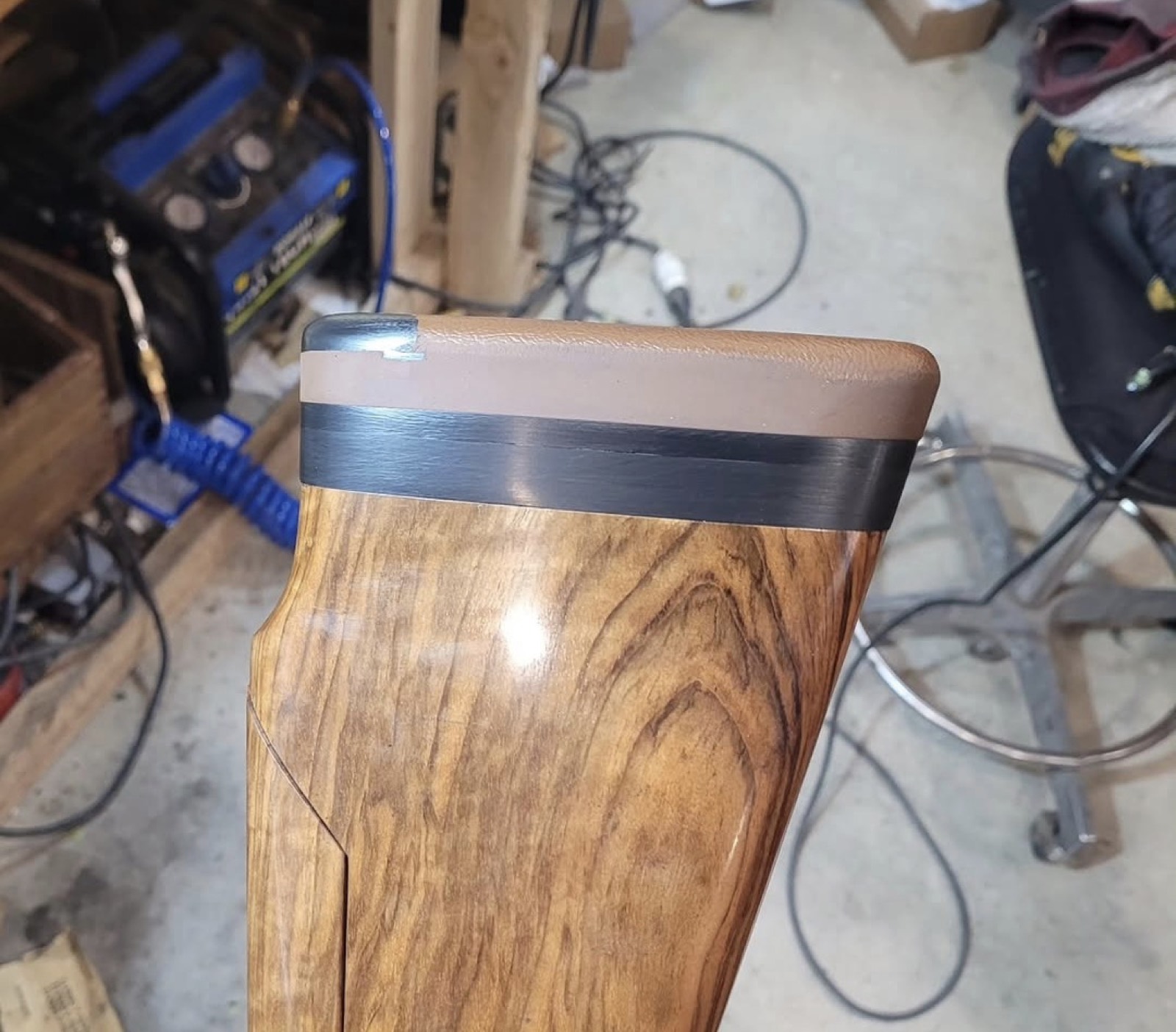Finished figured-walnut shotgun stock