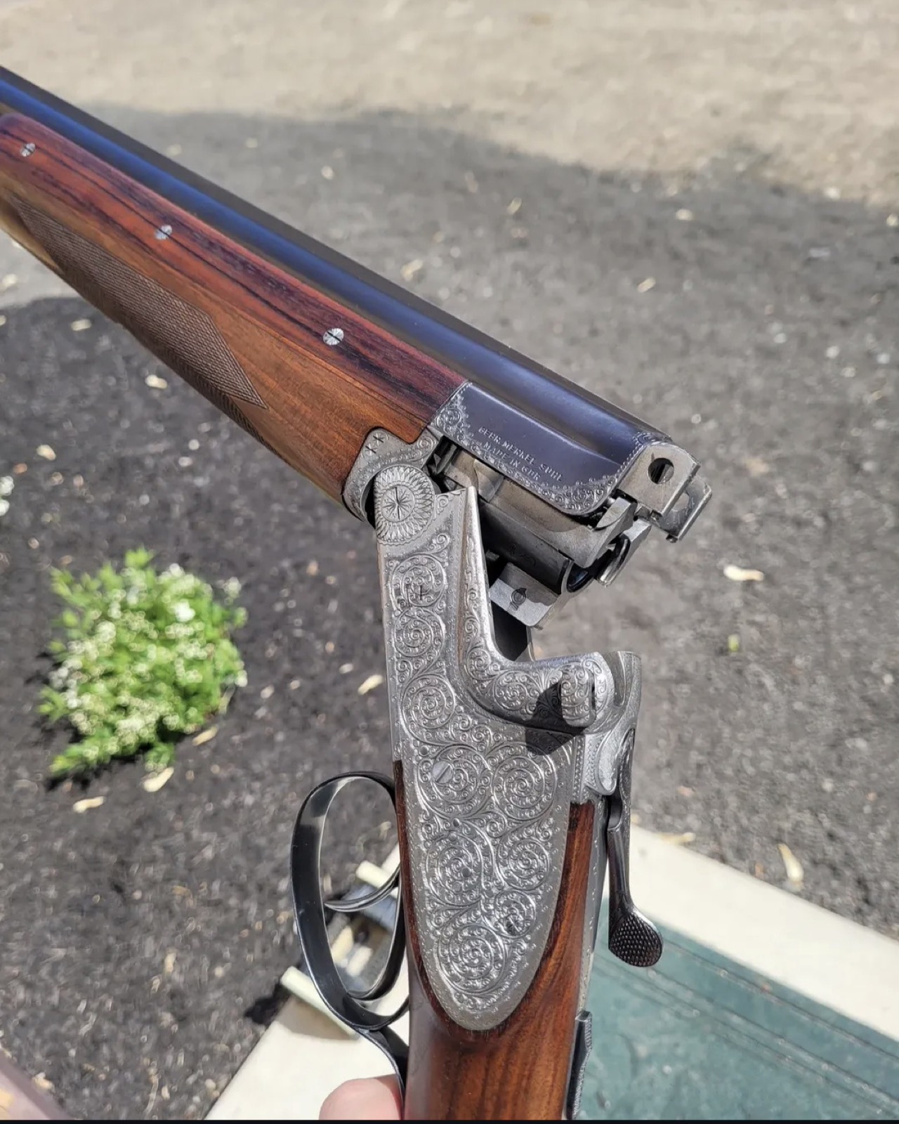 Engraved side-by-side shotgun, action open